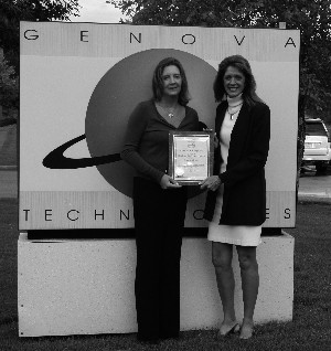 Ruth Fleming (l), chapter president, welcomes Dawn Ainger (r), chief executive officer of Genova Technologies, at the September meeting in recognition of Genova Technologies' new corporate membership. 